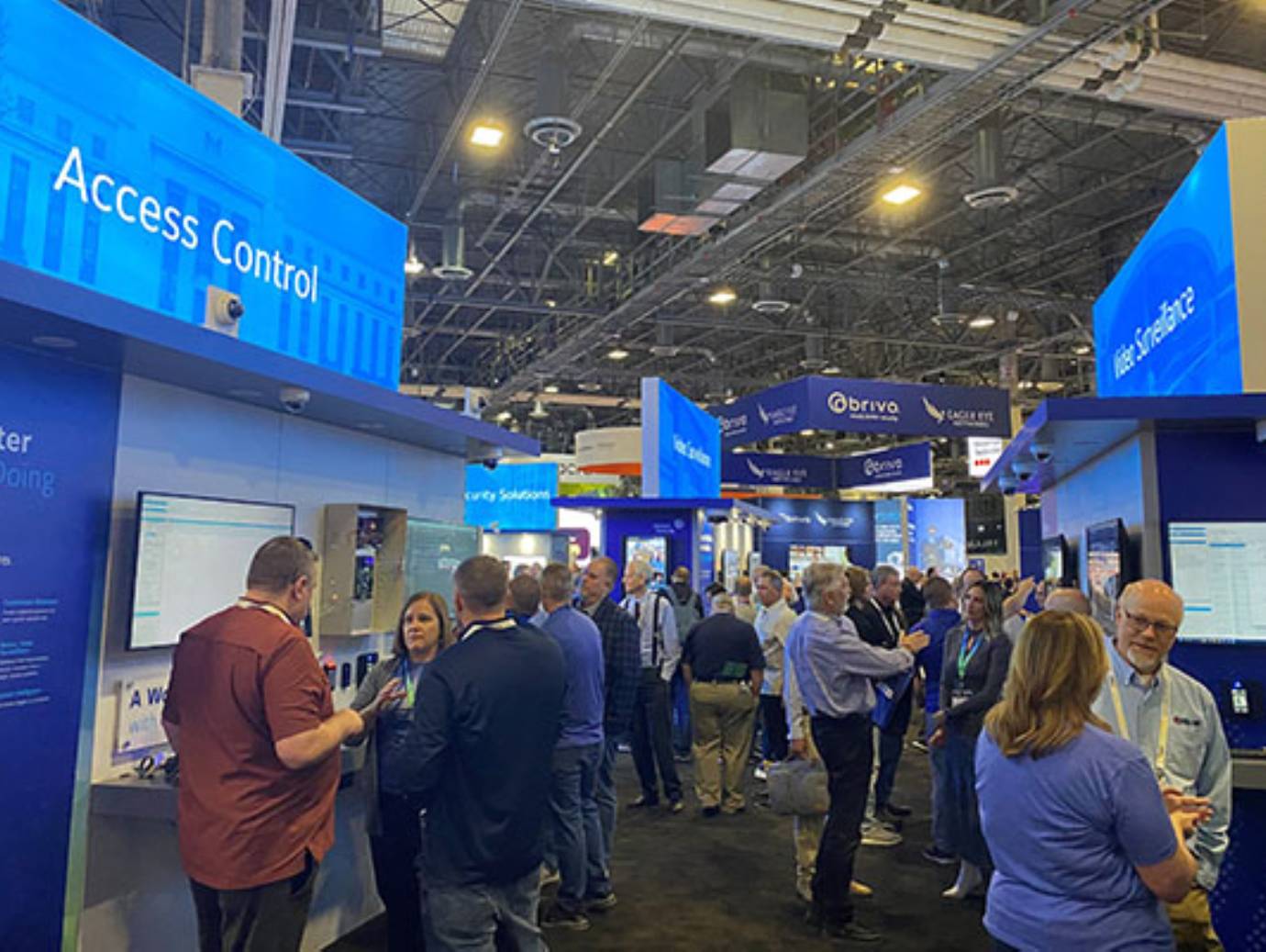 People gathered around a Johnson Controls exhibit at the ISC West Expo 2024 