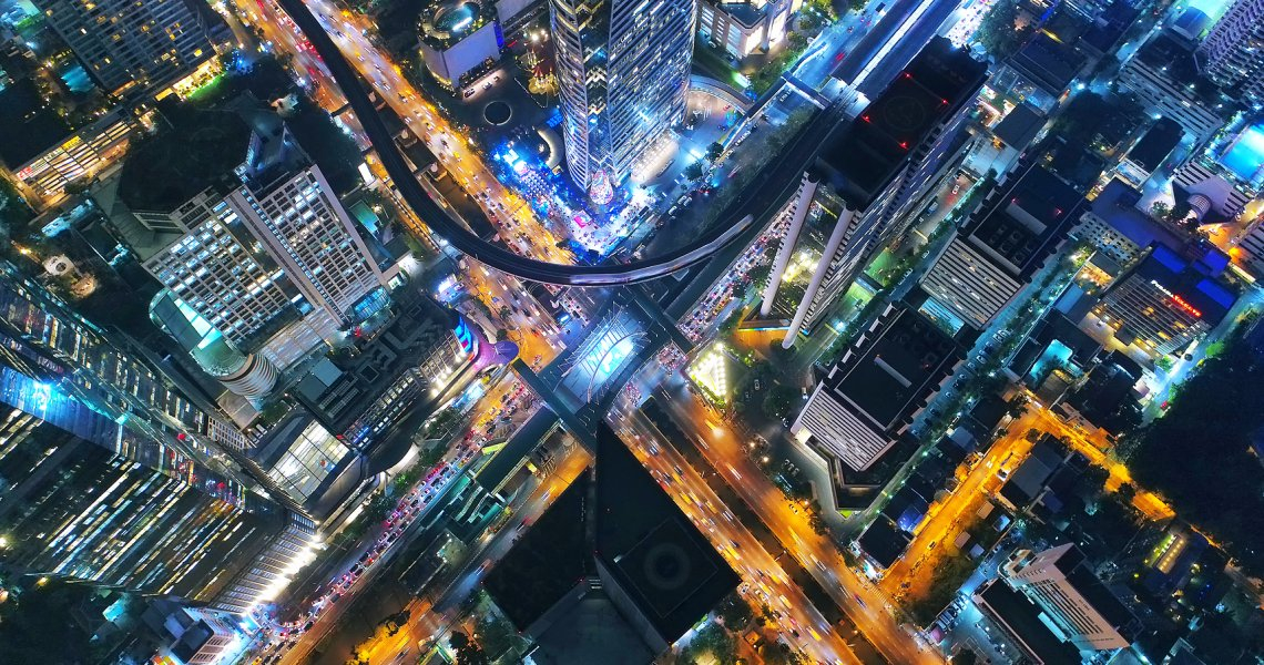Aerial view of a busy metropolitan city at night