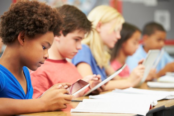 Children's are sitting in a classroom