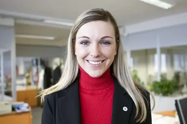 Woman smiling at a camera