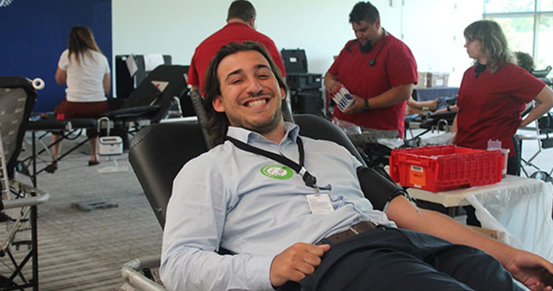 A Johnson Controls intern participating in the American Red Cross Blood Drive