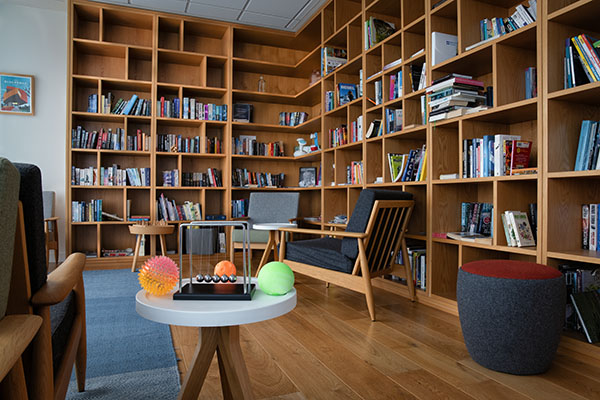Pictured is one of the dedicated quiet zones that is contributing to a more welcoming and productive environment for Johnson Controls Cork employees. It features updated paint and lighting, fidget tools and furniture with tilt/rock movement to create a more welcoming environment and foster collaboration.