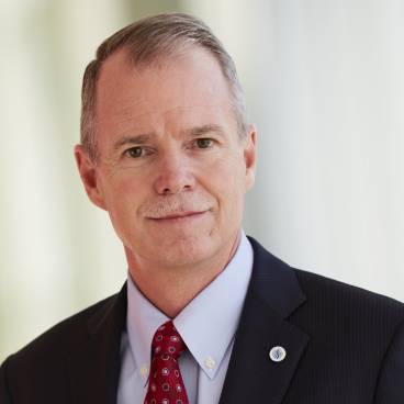 Headshot of George Oliver, CEO and Chairman of Johnson Controls