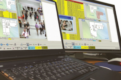 laptop and a computer next to each other, displaying information