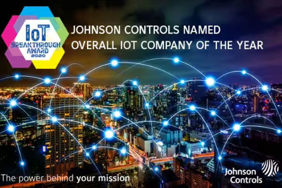 Cityscape at nighttime with modern graphics and the IoT Breakthrough Award  2020 logo