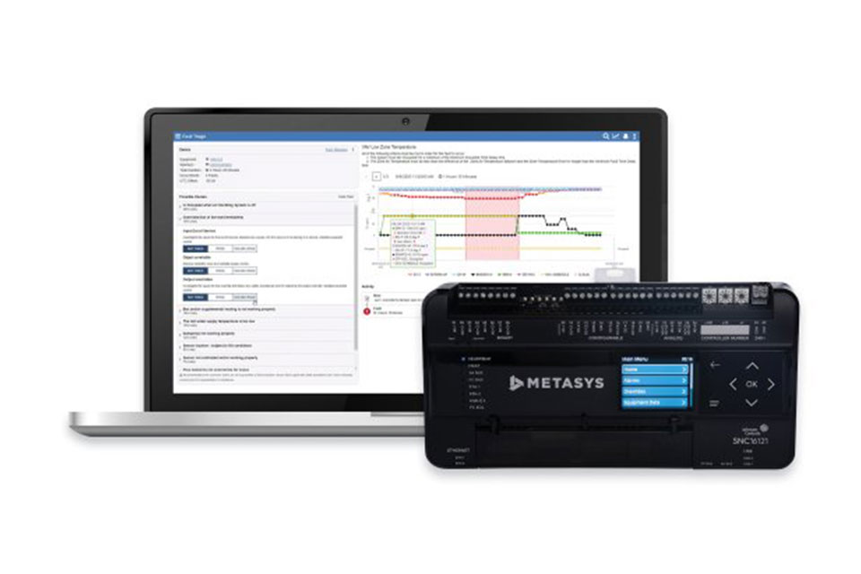 Laptop displaying data next to Metasys equipment 