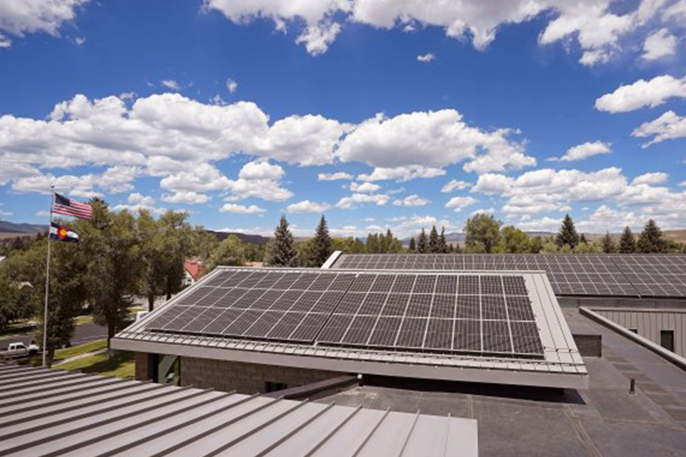Solar panels in operation on the roof of the Gunnison County courthouse