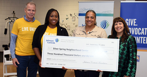 George Oliver distributing  "Smart and Healthy Neighborhood" grants for Milwaukee-area nonprofit organizations